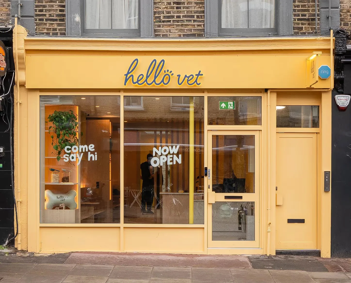 Yellow Hello Vet Clapton storefront and entrance on Chatsworth Road