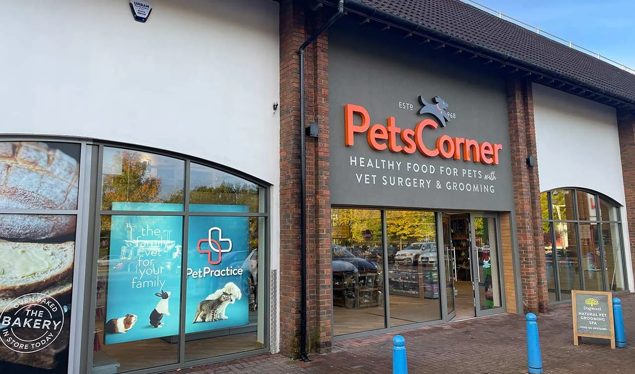 Pet Practice signs beside the Pets Corner entrance at Chineham Shopping Centre, Basingstoke