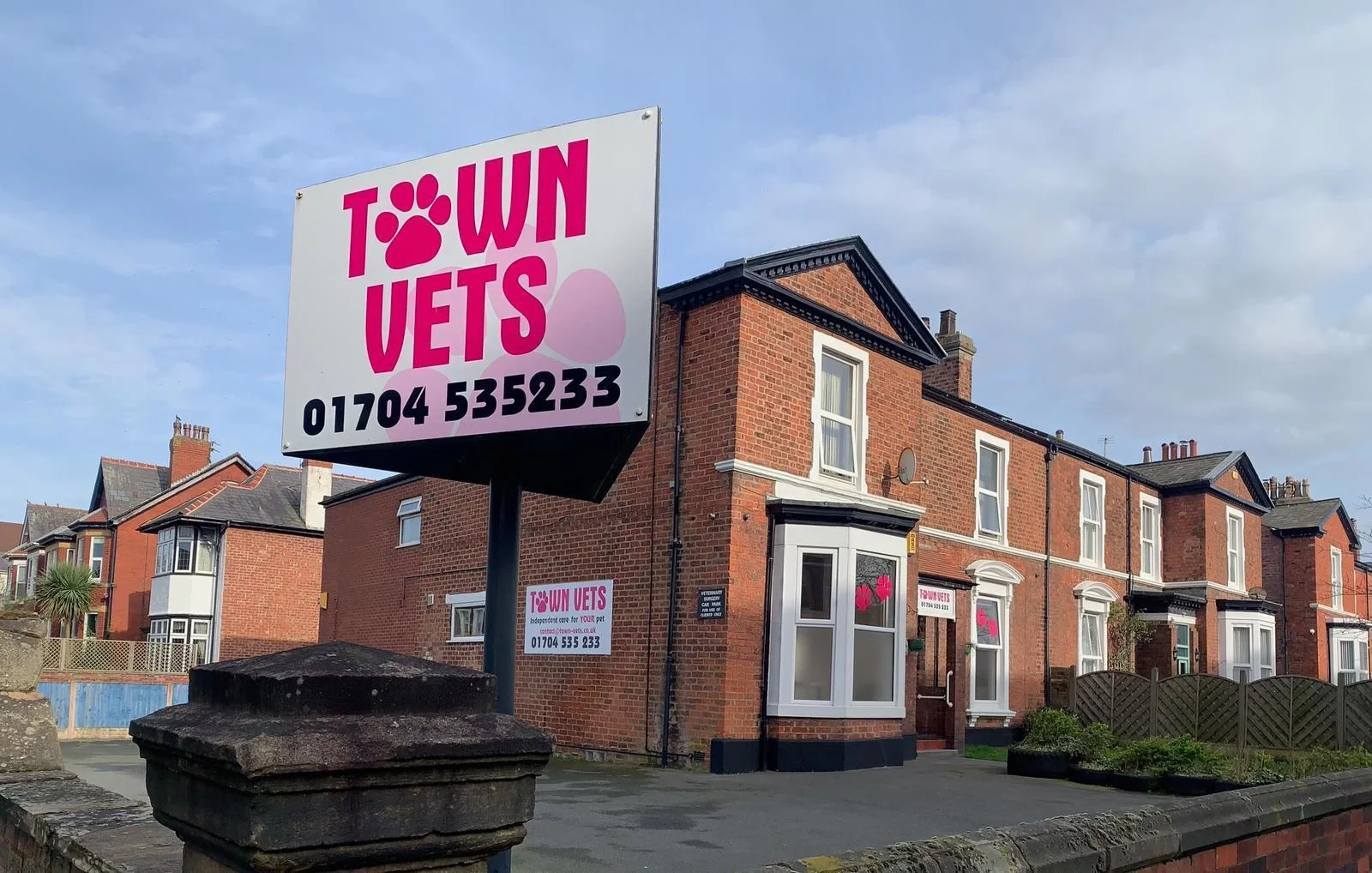 Exterior and sign of Town Vets