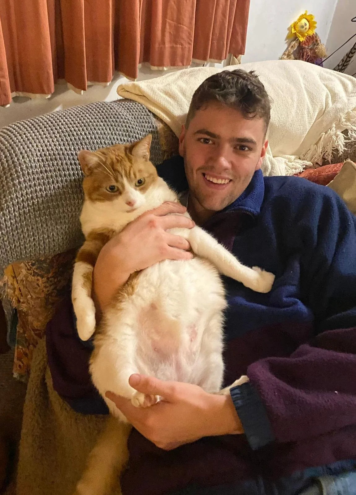Williamson Vets team member holding a cat at the Whitchurch practice