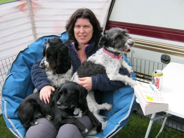 Aquarius Veterinary Centre team member with dogs at the Mildenhall practice
