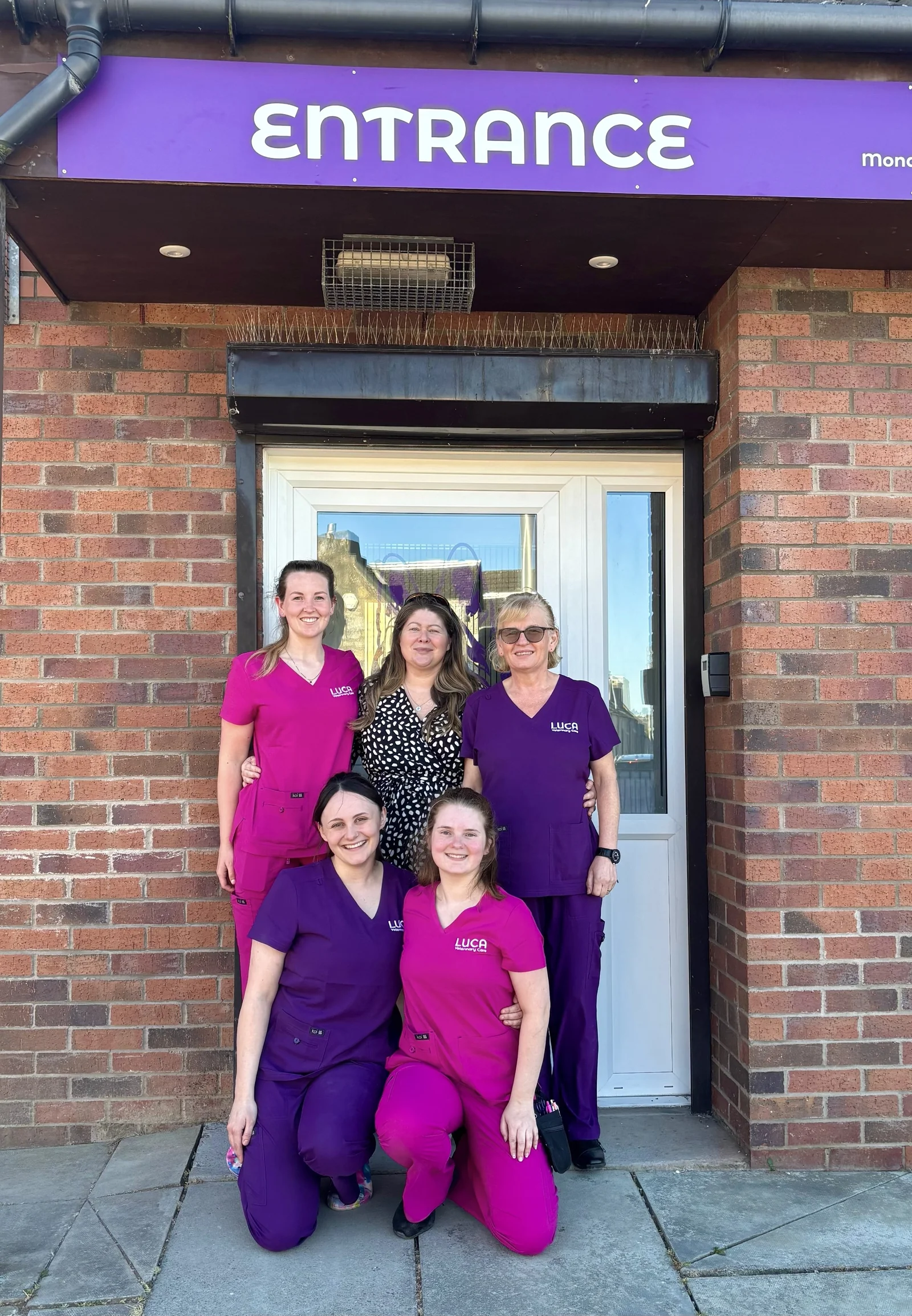 Luca Veterinary Care team at the practice entrance in Larkhall