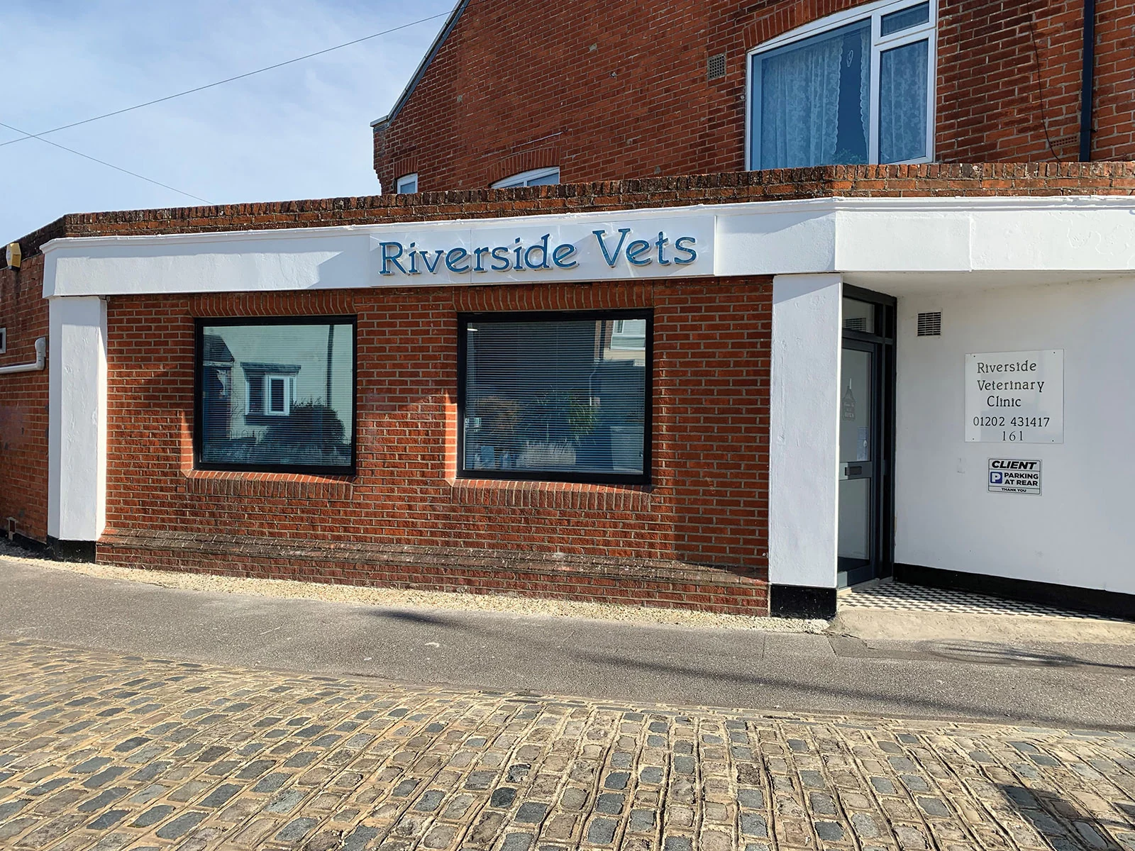 Riverside Veterinary Clinic entrance and sign in Tuckton