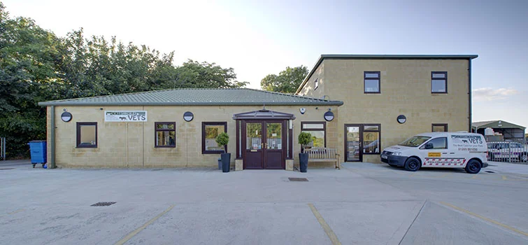 Cotswold Vets practice building and parking area near Cirencester